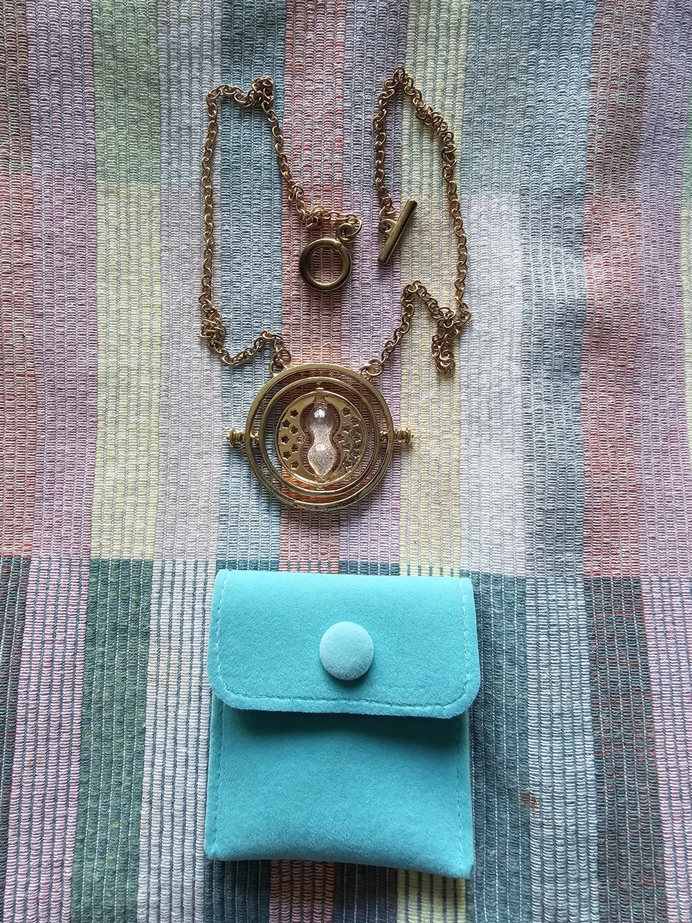 Gold Time-Turner Pendant Necklace with Turquoise Pouch